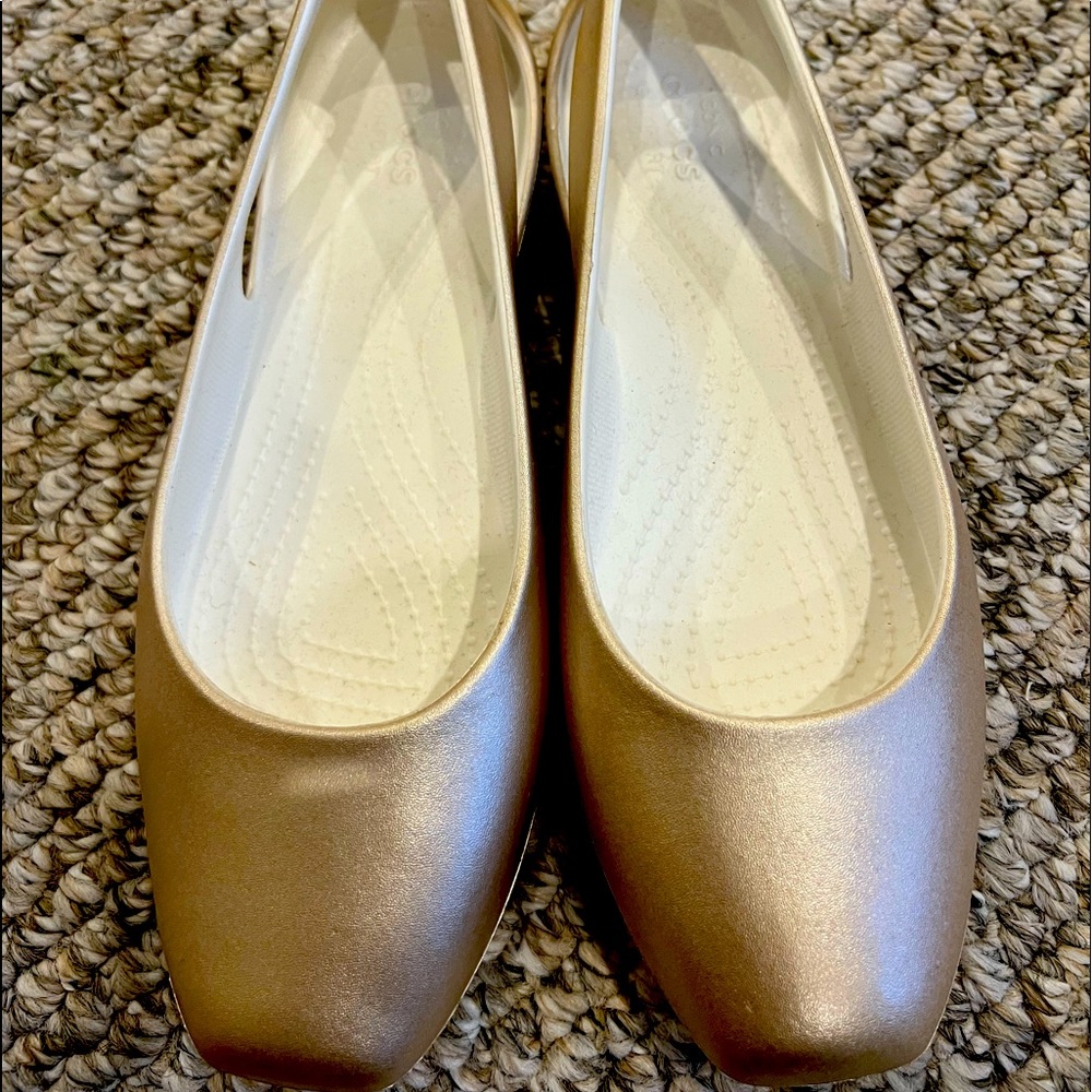 Brand new. Gold, ballerina flats